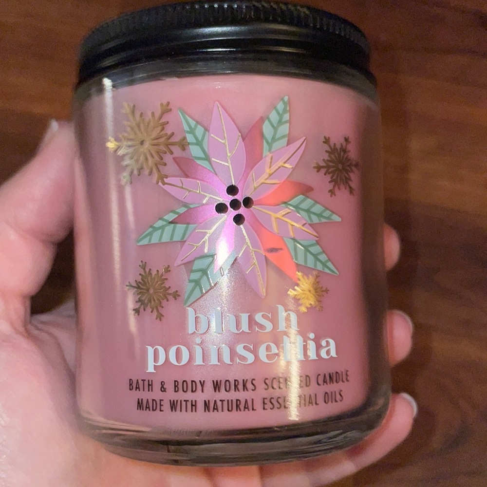 Blush poinsettia candle